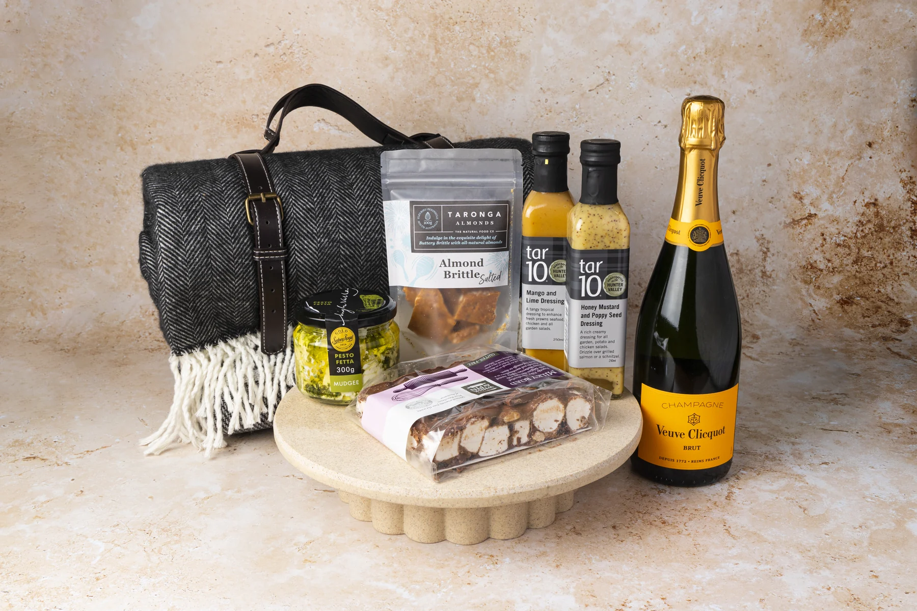Bespoke hamper with premium food, sparkling wine and a branded blanket